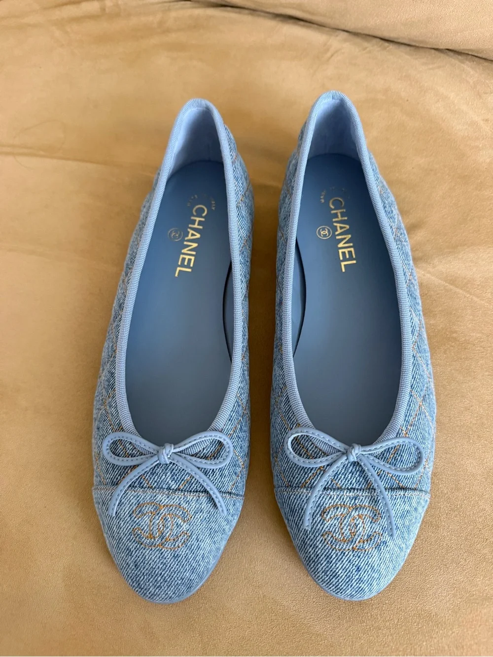 CHANEL Light Denim Quilted Ballet Flats with Bow - Size 41.5